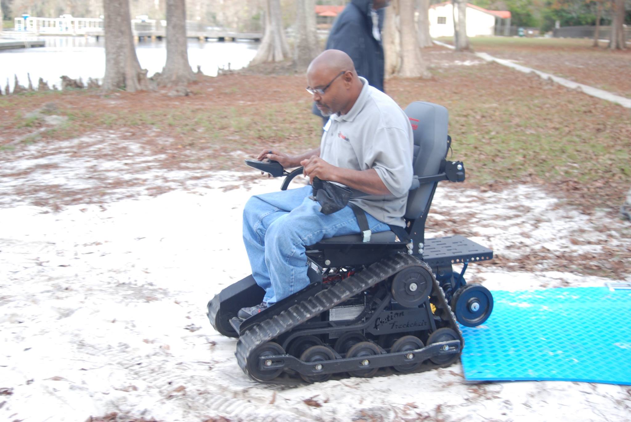Cordell Jeter riding in a track chair